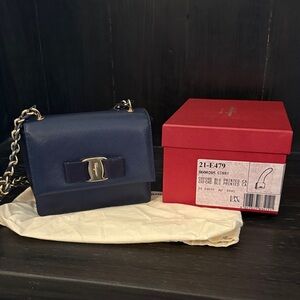 Salvatore Ferragamo Ginny navy bag. Never been used. Box and bag included.